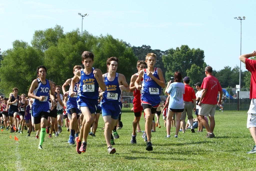 Cross country men, women advance to state